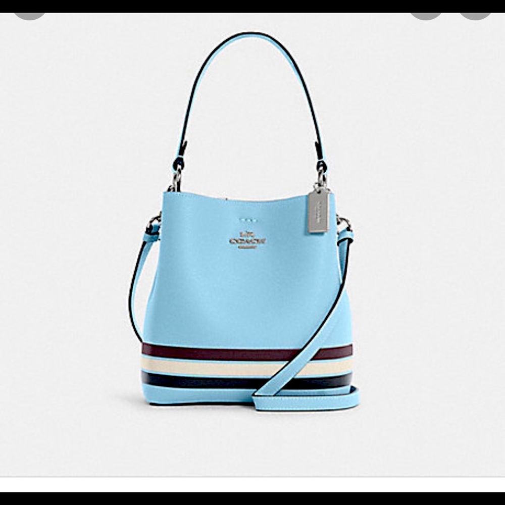 SMALL TOWN BUCKET BAG IN COLORBLOCK WITH STRIPE and matching wallet.